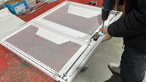 Manual assembly and welding of vented panels for VR Charging Cart