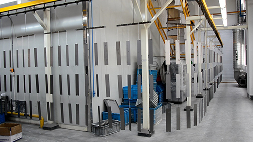 Powder coating and spray booth for durable finish on charging cart for tablets and laptops
